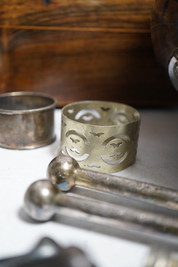 A Regency rosewood tea caddy, three pairs of nut crackers including a novelty skull nut cracker, a plated bowl, two napkin rings and a Wedgwood dish. Condition - varies